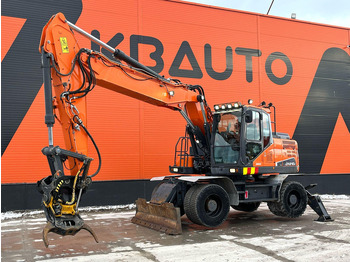 حفار ذو عجلات DOOSAN DX210