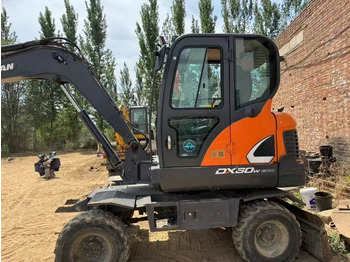 حفار ذو عجلات DOOSAN DX60W