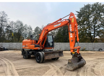 حفار ذو عجلات DOOSAN DX140W-3