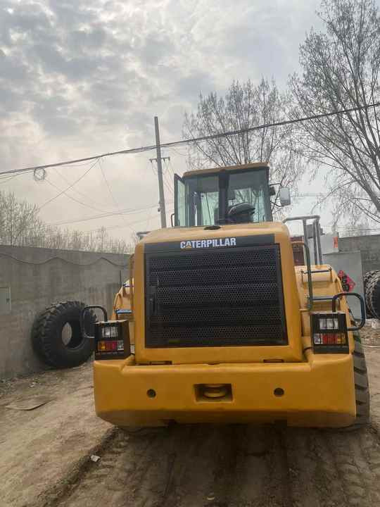 اللودر بعجل second hand good condition and high performance cat 950h cheap price for sale in shanghai yard: صورة 6